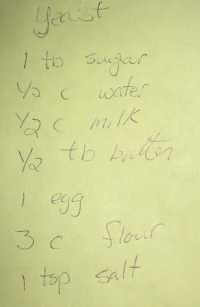 Handwritten recipe: yeast, 1 tb sugar, 1/2 c water, 1/2 c milk, 1/2 tb butter, 1 egg, 3 c flour, 1 tsp salt